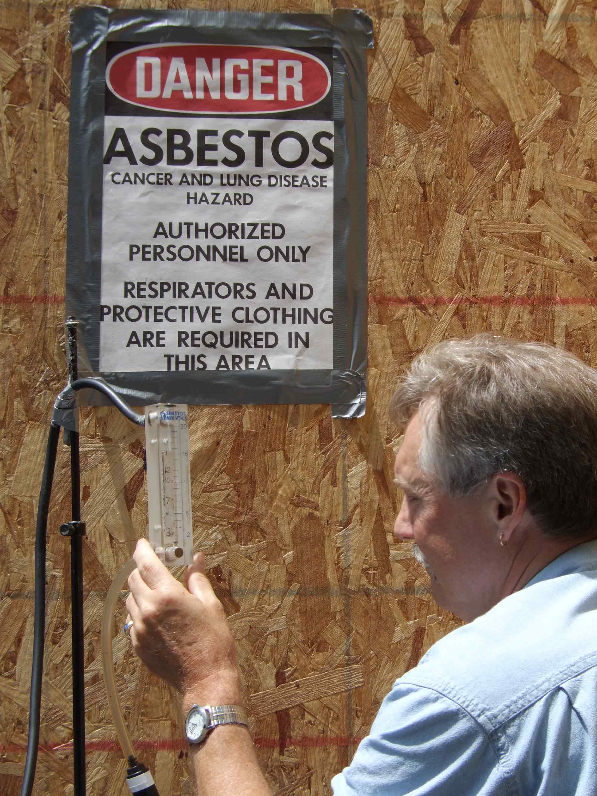 asbestos abatement danger sign
